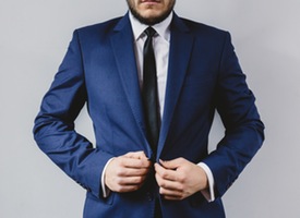 Man with beard in suit
